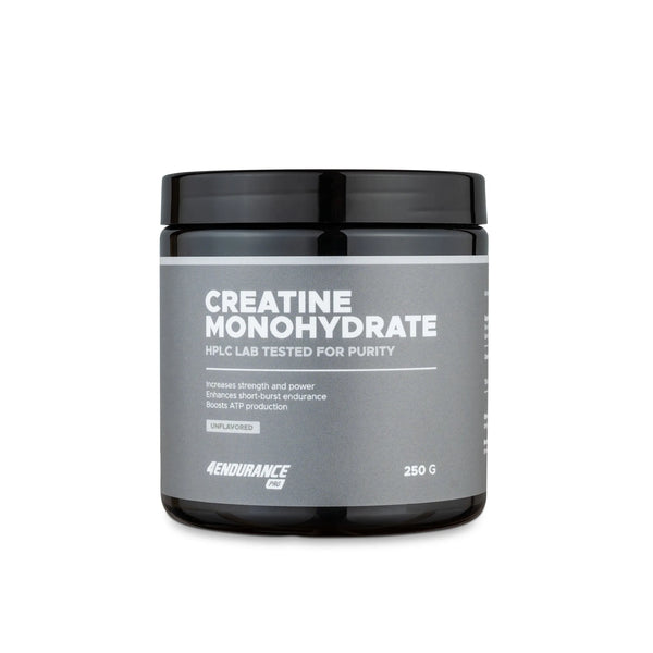 Container of creatine monohydrate powder with label on a white background

